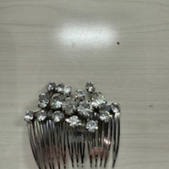Pair of  silver and rhinestone hair combs purchased from Zitomers